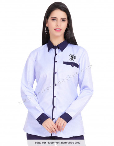 FEMALE BLUE DOTTED SHIRT WITH NAVY BLUE PIPING view 1